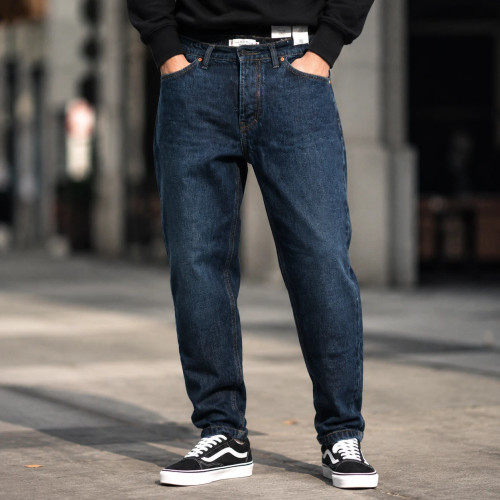 شلوار جین مردانه مامفیت رنگ آبی نفتی تیره سنگشور ملایم مدل MOM FIT Jean Tommy Denim