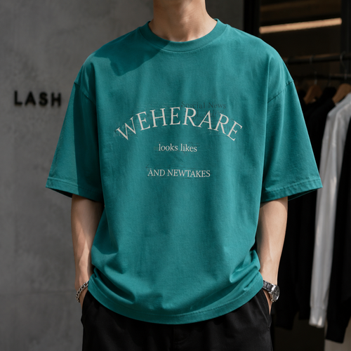تیشرت لش باکسی استایل خیابانی با طرح گرافیکی WEHERARE | رنگ سبز یشمی | Forest Green Boxy-Fit Streetwear Graphic Tee (WEHERARE Design)