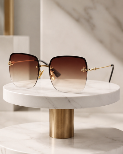 عینک آفتابی Gucci GG0982S با فریم فلزی طلایی و لنز گرادیانی قهوهای